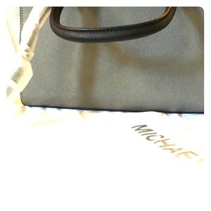 Never used Michael kors purse in box